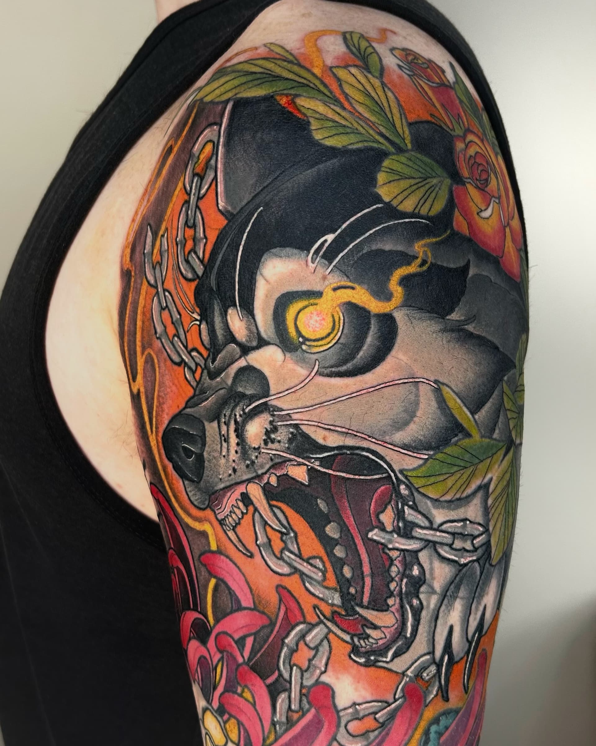Featured wolf with chains and flowers tattoo by Vancouver neo-traditional artist Seth Zuiev