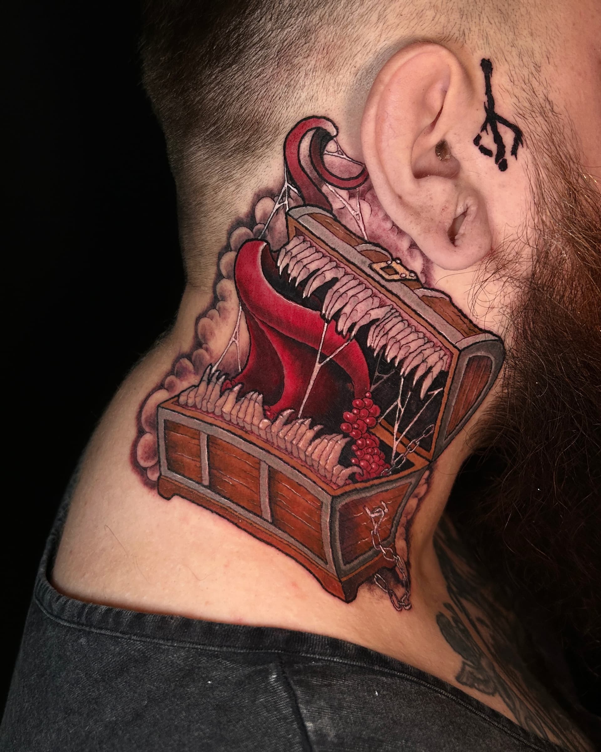 Fantasy mimic chest creature tattoo by Seth Zuiev — bold Vancouver neo-traditional tattoo work